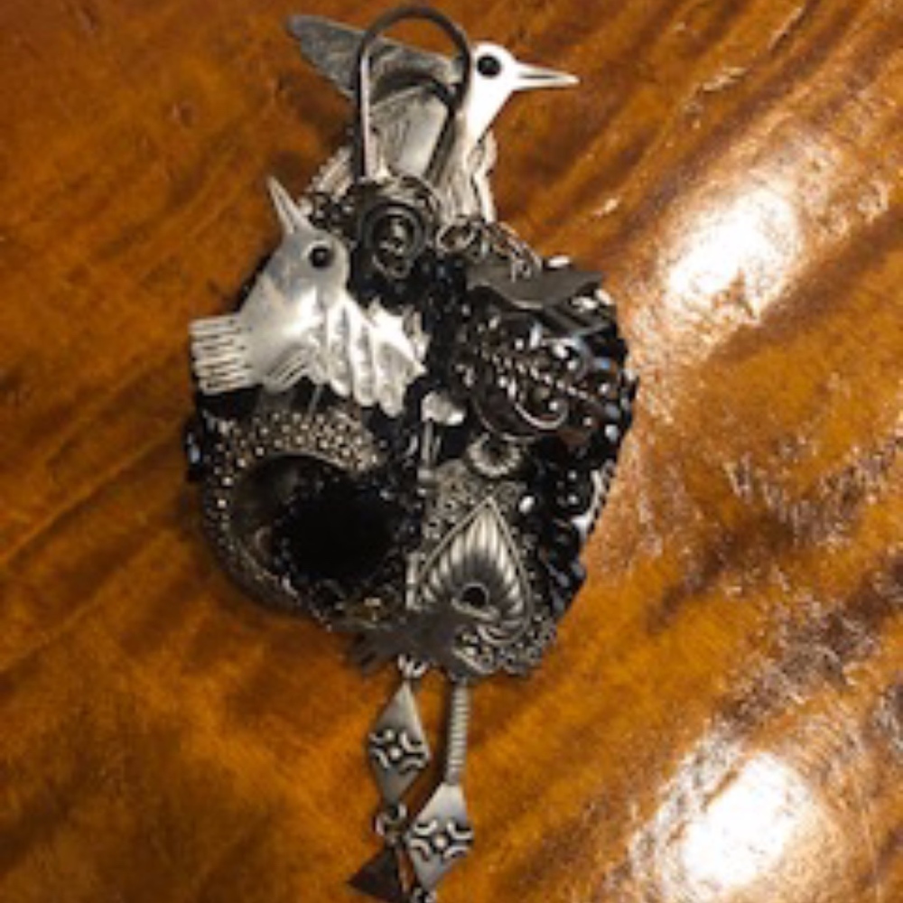 silver & black brooch